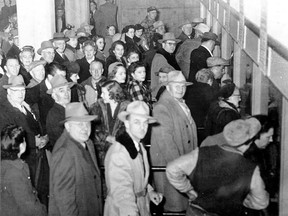 People line up at the new ticket office to purchase advance tickets to the1953  Grandstand events.
Photo: Herald archives