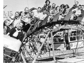 Thrills, and then more thrills. Roller coaster riders at the Calgary Stampede, circa 1961.
Photo: Herald archives