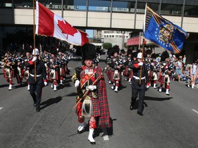 The Calgary Police Service Pipe Band at the 2006 Calgary Stampede parade. 
Photo: Herald archives