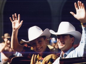 Olympic medal winners Tracy Wilson and Brian Orser traded in their skates for Stetsons when they rode in the July 9, 1988 parade. Herald file photo.