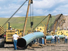 A gas pipeline expansion in 1997 south of Longview, harkens back to the  beginning of Alberta's natural gas industry in the early 1900s. Herald file photo.