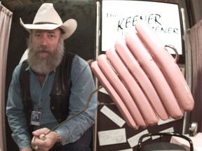 Ron Green, inventor of the Keener Wiener Roaster, a simple but unique metal skewer that cooks wieners with relative ease. 
Photo: Herald archives