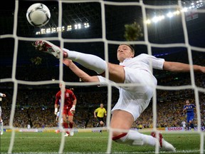 John Terry of England clears an effort from  Marko Devic of Ukraine off the line during the UEFA EURO 2012 group D match between England and Ukraine at Donbass Arena on June 19, 2012 in Donetsk, Ukraine. Replays later showed the ball crossed the goal line.  (Photo by Laurence Griffiths/Getty Images)