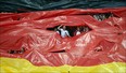 Fans of Germany's national football team display a giant flag ahead of the Euro 2012 football championships quarter-final match Germany vs Greece on June 22, 2012 at the Gdansk Arena.    ANNE-CHRISTINE POUJOULAT/AFP/GettyImages