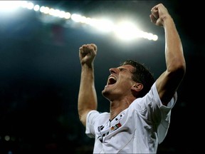Mario Gomez of Germany celebrates scoring their first goal during the UEFA EURO 2012 group B match between Germany and Portugal at Arena Lviv on June 9, 2012 in L'viv, Ukraine.  (Photo by Joern Pollex/Getty Images)