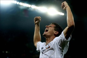 Mario Gomez of Germany celebrates scoring their first goal during the UEFA EURO 2012 group B match between Germany and Portugal at Arena Lviv on June 9, 2012 in L'viv, Ukraine.  (Photo by Joern Pollex/Getty Images)