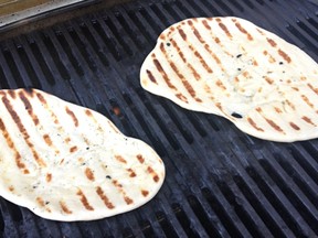 Naan bread on the barbecue. Pretty sure at least one of these was drenched in melted butter and devoured shortly after this photo was taken.