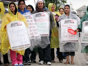 Locked out employees of Monterey Place seniors care centre in Calgary picket on Tuesday.