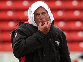 Here's hoping the rain stays away and that John Hufnagel doesn't pull this fashion ensemble out any time soon.