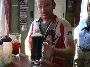 Calgarian Craig Stappler enjoying a well-earned cold one during the Tour Divide. This photo was posted to the Tour Divide forum at http://www.bikepacking.net.