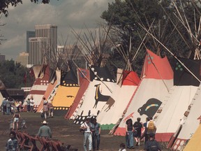 Canada's largest wooden flagpole was erected near the Indian Village on the Stampede grounds in 1982. Herald file photo.