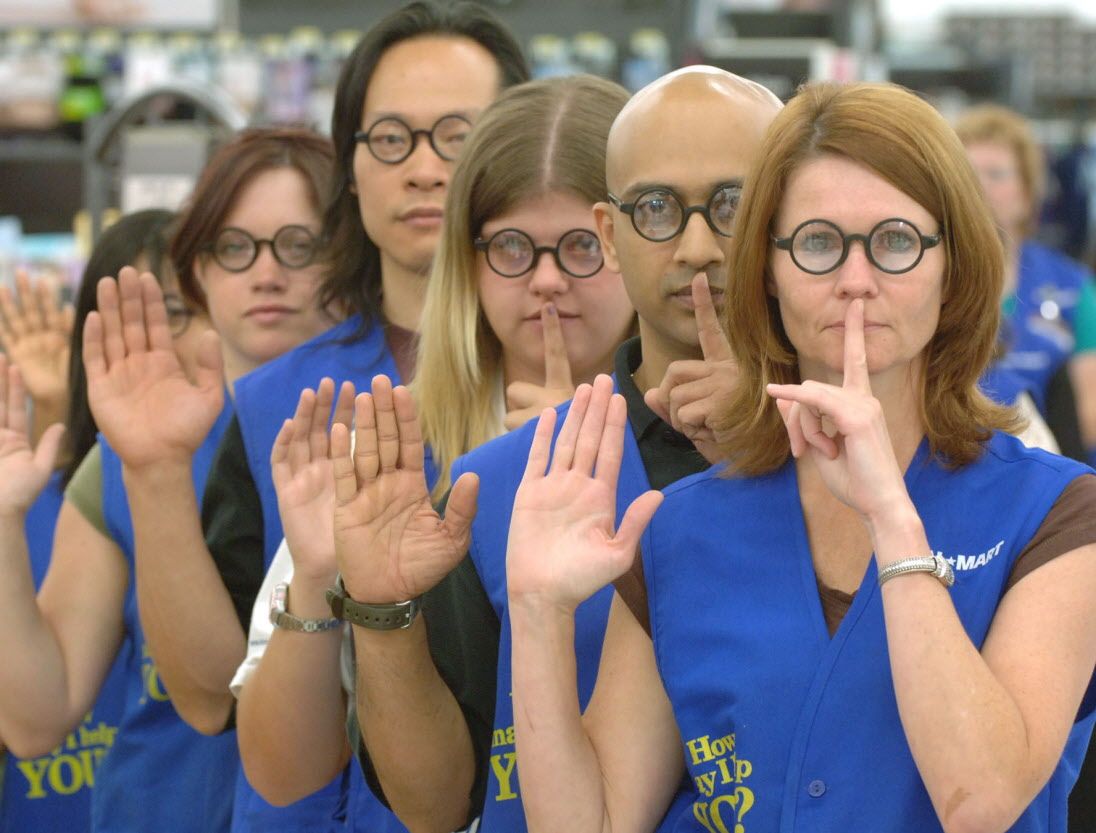 Muted muggles: Toronto Wal-Mart associates pledge not to reveal the ending to the last installment of the Harry Potter series, Harry Potter and the Deathly Hallows.  Herald file photo.