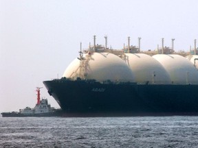 An LNG tanker leaves port in Japan. Prices are down slightly but nearly six times the New York close for natural gas.