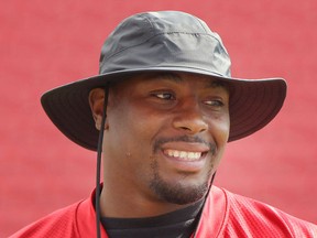 A relaxed Nik Lewis takes part in the Stamps' walk-through practice on Wednesday at McMahon Stadium. Photo, Leah Hennel, Calgary Herald