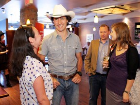 LIberal MP Justin Trudeau speaks to supporters at a fundraiser for the Liberal candidate running in the by-election in Calgary - Centre. Grant Black, Calgary Herald