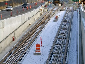 The under-construction west LRT track running down the centre of Bow Trail on Sunday April 6, 2011. Gavin Young/Herald