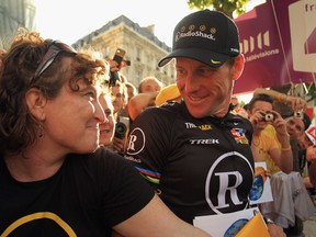 Lance Armstrong of team Radioshack chats with fans after the twentieth and final stage of Le Tour de France 2010, from Longjumeau to the Champs-Elysees in Paris on July 25, 2010 in Paris, France.  Getty Image Archive