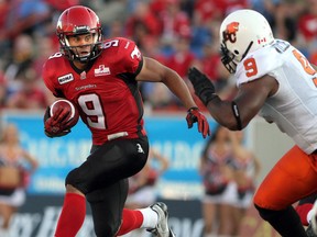 Creating some open space for running back Jon Cornish, left, will be a priority for the Stamps going into Thursday's game in Hamilton. Photo, Ted Rhodes, Calgary Herald