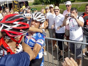 Like these two Tour de France racers who came to blows, cyclists are increasingly confronting each other over scofflaw behaviour. Getty Images.