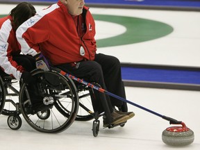 Jim Armstrong, seen during action at the 2009 world wheelchair curling championship, is again eligible to curl internationally for Canada after having his doping suspension reduced to six months. Photo,
Dallas Bittle/World Curling Federation