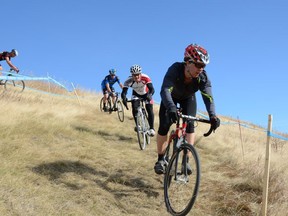 A recent cyclo-cross race in Calgary, where dry fields of grass are more common than muddy bogs. Photo courtesy, Steve Walsh. http://www.greencirclephoto.com/Bikes