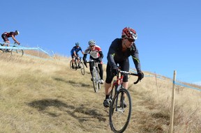 A recent cyclo-cross race in Calgary, where dry fields of grass are more common than muddy bogs. Photo courtesy, Steve Walsh. http://www.greencirclephoto.com/Bikes
