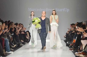 Designer Duy Nguyen wins the Mercedes Benz Start Up National Final at Toronto Fashion Week in Toronto. Photo: The Canadian Press.