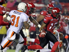 Stamps receiver Maurice Price, right, breaks loose en route to his first-quarter touchdown against the B.C. Lions on Friday. Photo, Colleen De Neve, Calgary Herald