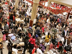 Black Friday is a big shopping tradition in the U.S., as seen here with shoppers taking advantage of deals at Macy's in New York. Should Canadians be embracing this tradition? Photo: Getty Images.