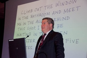 A mysterious representative of kids author Lemony Snicket, who may have been the man himself, at an event billed as a "secret meeting" at the downtown library Wednesday night. Photo, courtesy, Monique de St. Croix.