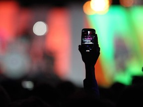 Student records video at We Day in Calgary.