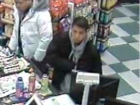 Surveillance image of two men seen at a convenience store near the shooting of Kevn Ses and Tina Kong in Oct. 2008. Police believe they have information about the crime.