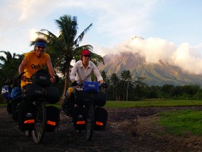 Janick Lemieux and Pierre Bouchard near the Mayon volcano, in the Philippines.