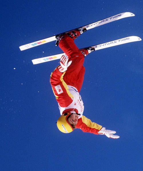 Canadian Anna Fraser, flipping in a wind-aided aerials competition in freestyle, which debuted Sunday as a demonstration Olympics event.