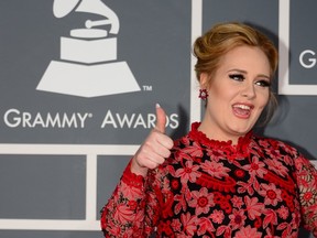 Adele gives thumbs up to the 55th Annual Grammy Awards on Sunday.