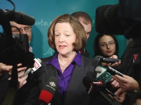 Premier Alison Redford took part in a summit with more than 350 Albertans on Saturday.