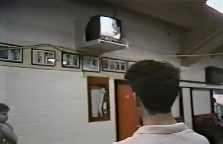 Brian Orser watches his rival Brian Boitano from backstage. Backrink?