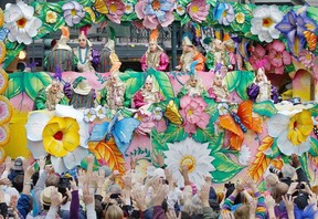 Mardi Gras 2013: Revelers plead with outstretched arms for throws (beads and small gifts) from riders in the Rex Parade in Canal Street on Mardi Gras Day. Fat Tuesday, the traditional celebration on the day before Ash Wednesday and the beginning of Lent, is marked in New Orleans with parades and marches through many neighborhoods in the city. Calgary Herald wire services.