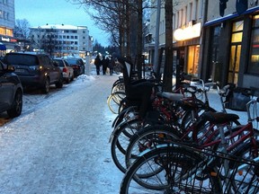 A typical street in Oulu, Finland in the winter is loaded with bikes. Seriously, you see this everywhere.