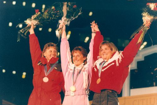 Karen Percy, right, celebrates her bronze medal in Super-G at Olympic Plaza. Sigrid Wolf of Austria (centre) won gold, and Michela Figini of Switzerland took silver