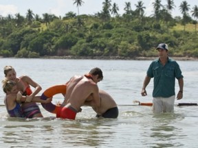 Host Jeff Probst, far right, oversees a challenge on the premiere of Survivor: Caramoan - Fans vs. Favorites.