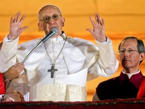 Pope Francis waving to the crowd at St. Peter's Square.