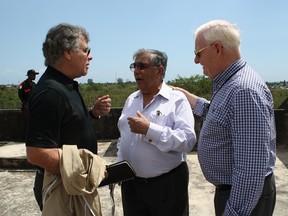 Three of Awali's founders -- Brian Felesky, Sherali Saju and Jim Gray -- discuss plans for a new campus that will offer increased professional development for teachers in Dar es Salaam, Tanzania. Photos by Monica Zurowski.