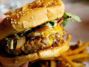 The burger from the Chuckwagon Cafe in Turner Valley. Photo by Gwendolyn Richards, Calgary Herald.
