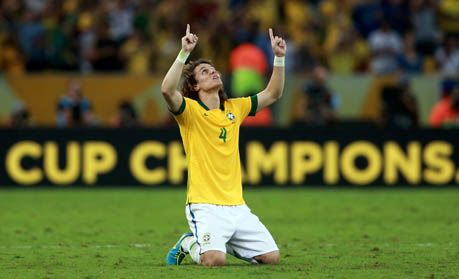 David Luiz of Brazil celebrates at the end of the FIFA Confederations Cup Brazil 2013 Final match between Brazil and Spain at Maracana on June 30, 2013 in Rio de Janeiro, Brazil.  (Photo by Scott Heavey/Getty Images) 
