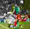 Italy’s forward Mario Balotelli (L) falls next to Mexico’s defender Hector Moreno during their FIFA Confederations Cup Brazil 2013 Group A football match, at the Maracana Stadium in Rio de Janeiro on June 16, 2013. AFP PHOTO / CHRISTOPHE SIMON