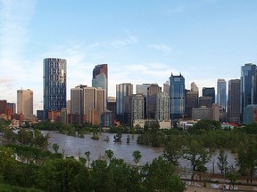 Looking across the Bow River at the Calgary downtown core towards Prince's Island Park from Crescent Heights during the flood of June 21, 2013.