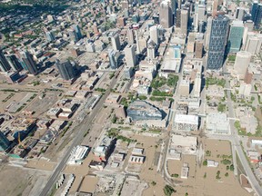 Downtown Calgary is seen from the air Saturday, June 22, 2013.  Jonathan Hayward/THE CANADIAN PRESS