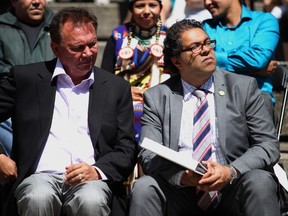 Tsuu T'ina Chief Roy Whitney and Mayor Naheed Nenshi watch an Aboriginal Awareness Week ceremony at Olympic Plaza. Lorraine Hjalte/Herald