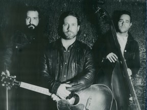 Chuck Ragan, centre, brought his Revival Tour to Calgary for two shows.